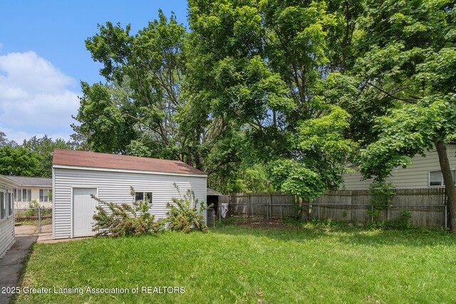 6327 Grovenburg Rd, Lansing, MI 48911 - view of yard with an outbuilding
