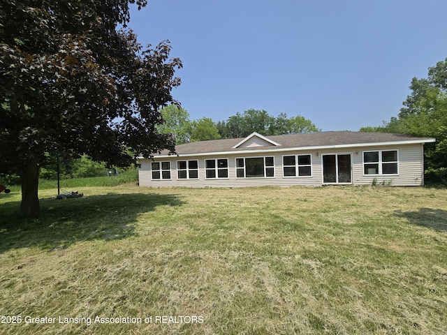 6322 Springport Rd, Eaton Rapids, MI 48827 - back of property featuring a lawn