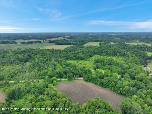 6322 Springport Rd, Eaton Rapids, MI 48827 - aerial overview of property's location featuring a heavily wooded area