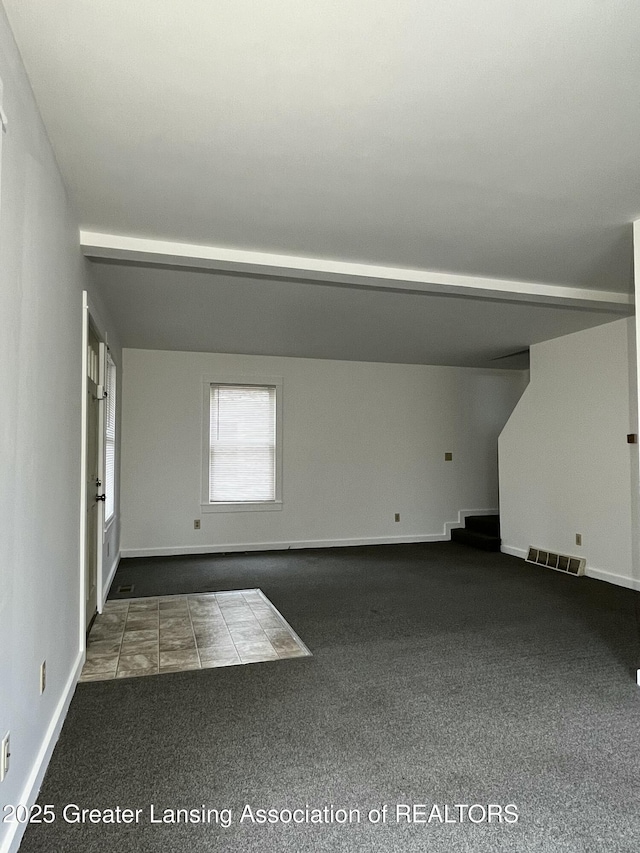 413 N Pennsylvania Ave, Lansing, MI 48912 - spare room with carpet and baseboards