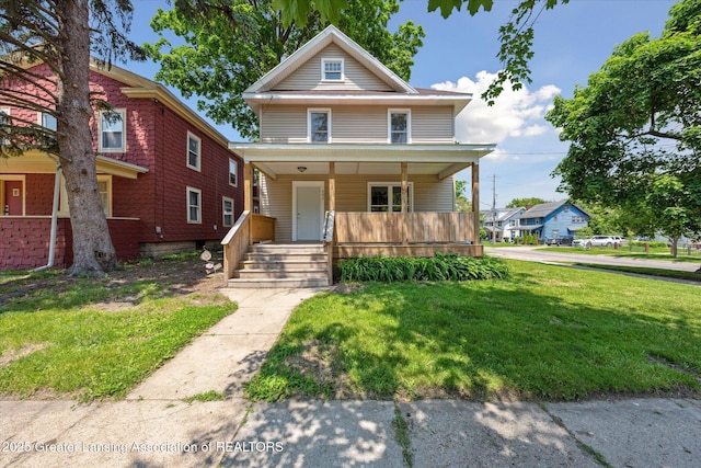 402 W Cesar E Chavez Ave, Lansing, MI 48906 - traditional style home with a porch and a front lawn
