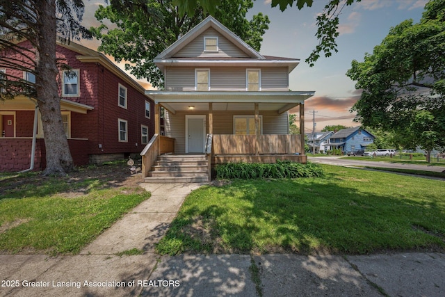 402 W Cesar E Chavez Ave, Lansing, MI 48906 - traditional style home featuring covered porch and a front yard