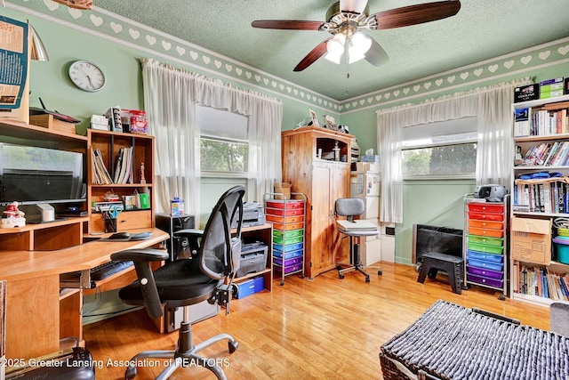 7713 Jon Scott Dr, Grand Ledge, MI 48837 - office with a textured ceiling, hardwood / wood-style floors, ceiling fan, and crown molding