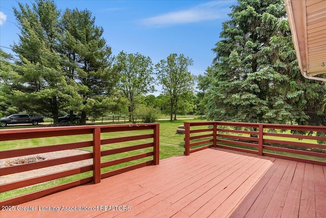 1941 S Royston Rd, Eaton Rapids, MI 48827 - deck with a yard