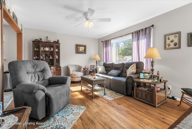 1727 Springfield Ln, Lansing, MI 48912 - living room featuring light wood-style flooring and ceiling fan