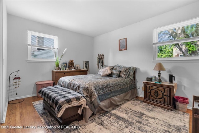 1727 Springfield Ln, Lansing, MI 48912 - bedroom with wood finished floors and baseboards