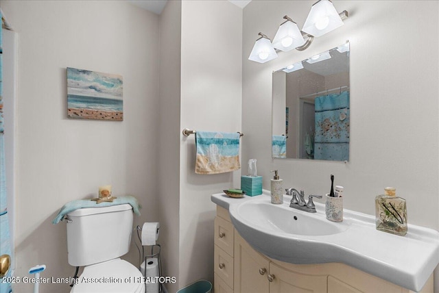 1727 Springfield Ln, Lansing, MI 48912 - full bath with vanity and toilet
