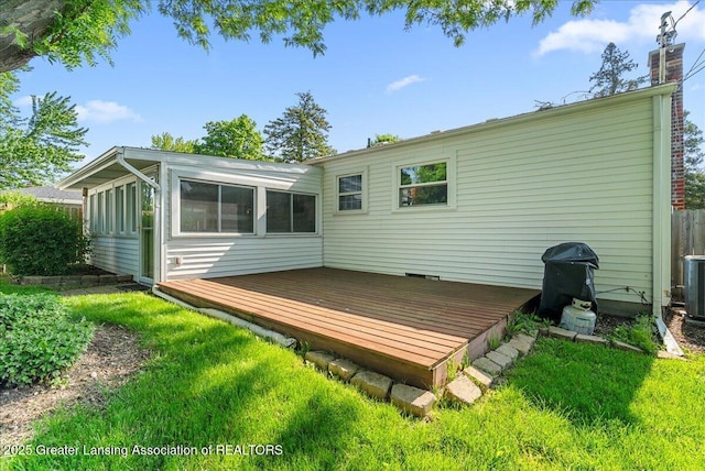 1727 Springfield Ln, Lansing, MI 48912 - back of house featuring a deck and a chimney