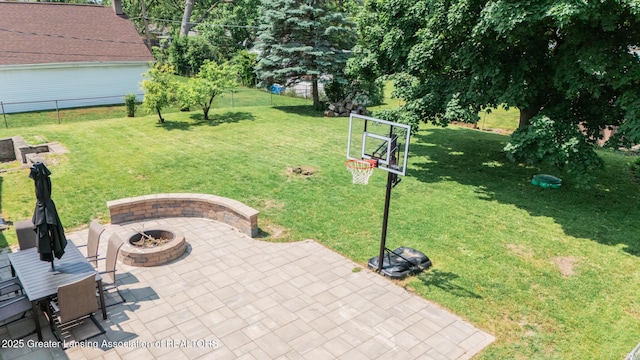 3326 W Willow St, Lansing, MI 48917 - view of patio with a fire pit