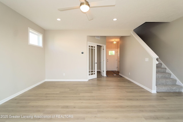 605 Landbridge, Perry, MI 48872 - unfurnished living room with recessed lighting, stairs, a ceiling fan, and light wood finished floors