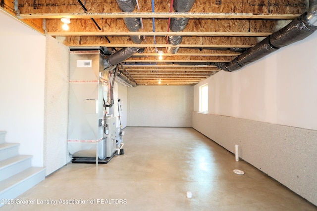605 Landbridge, Perry, MI 48872 - basement featuring heating unit