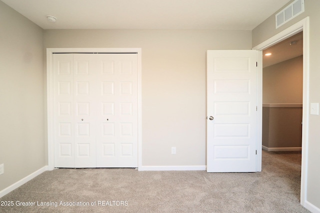 605 Landbridge, Perry, MI 48872 - unfurnished bedroom with carpet flooring, a closet, and recessed lighting