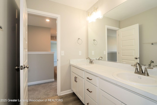 605 Landbridge, Perry, MI 48872 - full bathroom with wood finished floors and double vanity