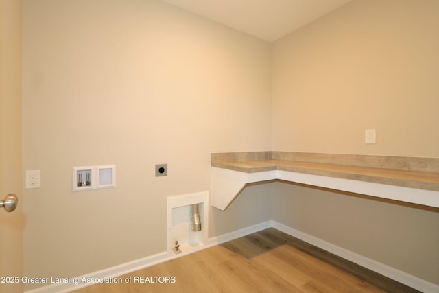 605 Landbridge, Perry, MI 48872 - laundry area featuring hookup for an electric dryer, hookup for a washing machine, and wood finished floors