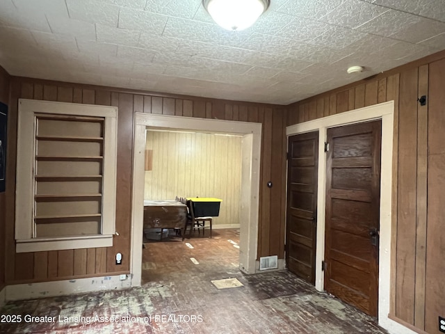 125 N E St, Mason, MI 48854 - corridor featuring wood walls