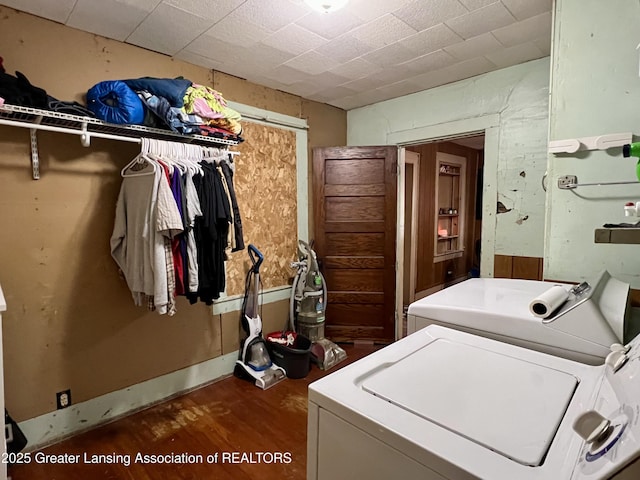 125 N E St, Mason, MI 48854 - laundry room featuring washer and clothes dryer and wood finished floors