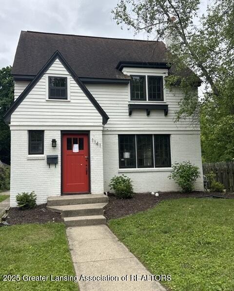 1141 N Genesee Dr, Lansing, MI 48915 - view of front of house with brick siding and roof with shingles
