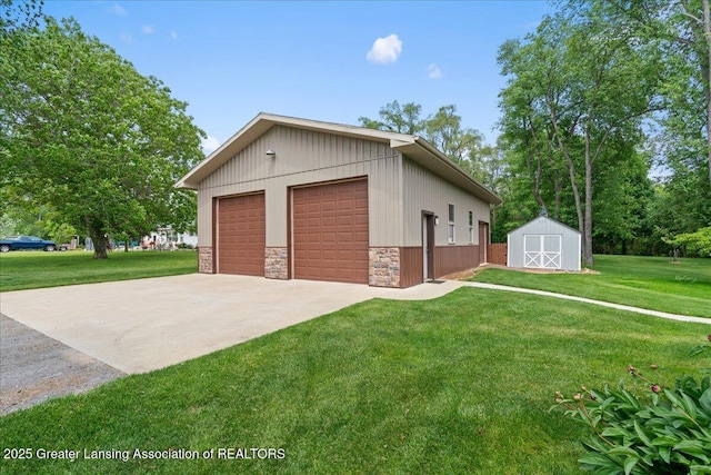 1055 Hull Rd, Mason, MI 48854 - detached garage with a storage unit