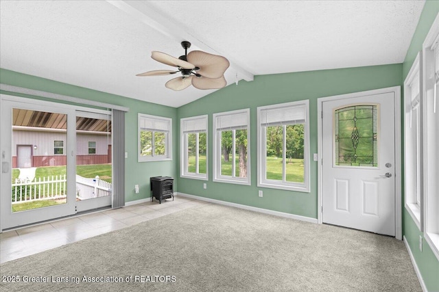 1055 Hull Rd, Mason, MI 48854 - unfurnished sunroom with a wood stove