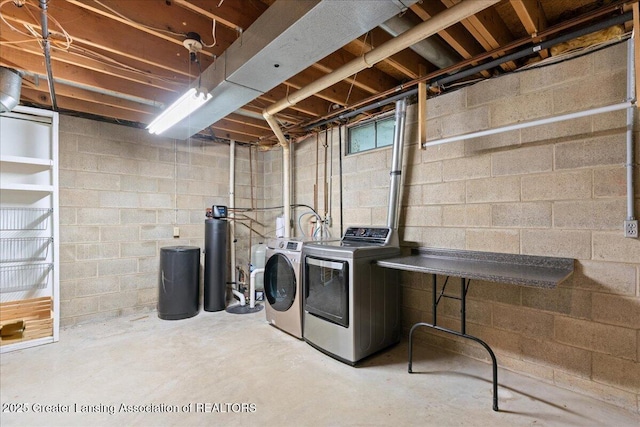 1055 Hull Rd, Mason, MI 48854 - washroom featuring separate washer and dryer