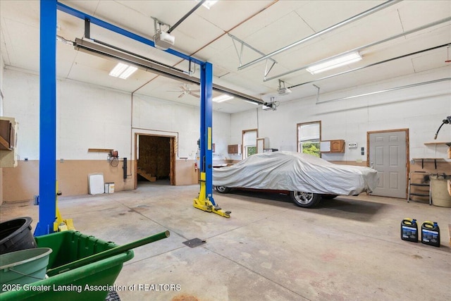 1055 Hull Rd, Mason, MI 48854 - garage with a garage door opener