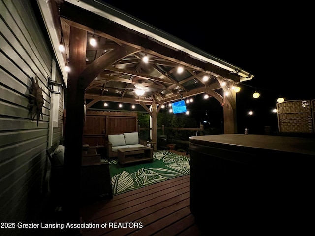 826 Clyde St, Lansing, MI 48915 - deck at twilight with a gazebo