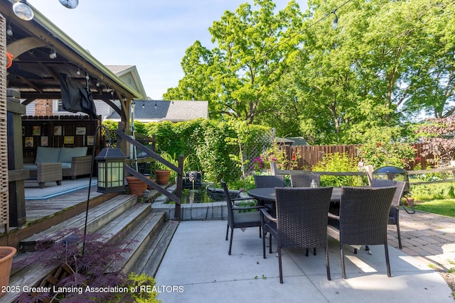 826 Clyde St, Lansing, MI 48915 - view of patio featuring outdoor dining space