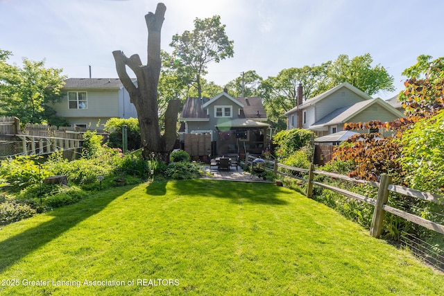 826 Clyde St, Lansing, MI 48915 - view of yard featuring a patio area