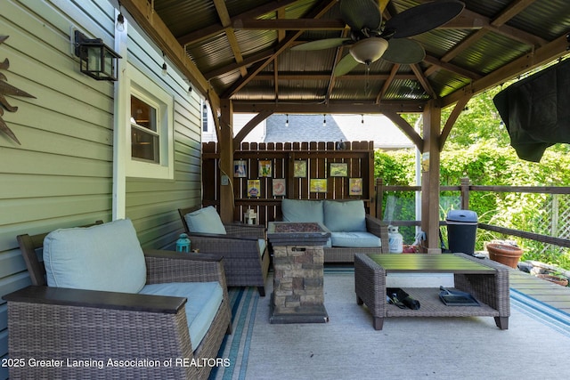 826 Clyde St, Lansing, MI 48915 - view of patio featuring outdoor lounge area, a gazebo, and ceiling fan