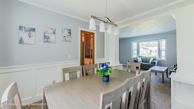 120 Chanticleer Trl, Lansing, MI 48917 - carpeted dining room with a decorative wall, ornamental molding, and a wainscoted wall