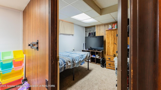 120 Chanticleer Trl, Lansing, MI 48917 - bedroom with carpet floors and a paneled ceiling