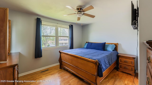 120 Chanticleer Trl, Lansing, MI 48917 - bedroom featuring light wood finished floors, baseboards, and ceiling fan