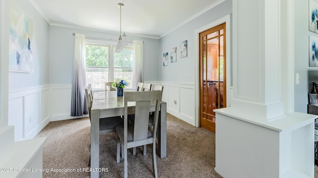 120 Chanticleer Trl, Lansing, MI 48917 - carpeted dining area with a decorative wall, ornamental molding, and a wainscoted wall