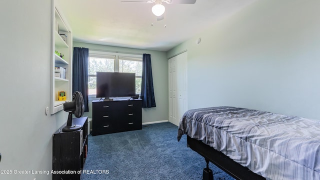 120 Chanticleer Trl, Lansing, MI 48917 - bedroom featuring dark colored carpet, a closet, a ceiling fan, and baseboards