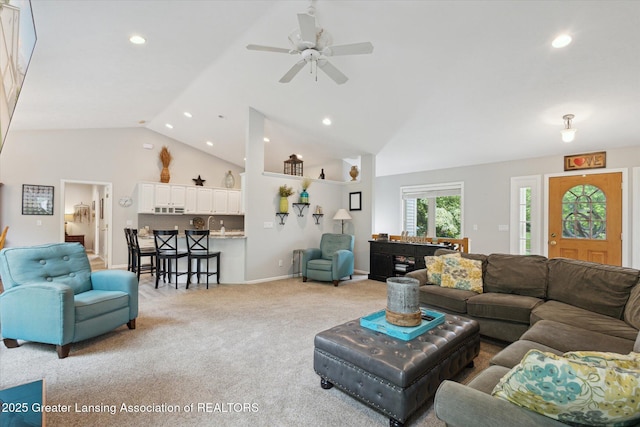 11782 Sara Ann Dr, Dewitt, MI 48820 - living area featuring light colored carpet, recessed lighting, a ceiling fan, and high vaulted ceiling