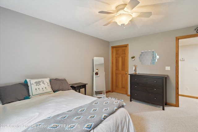11782 Sara Ann Dr, Dewitt, MI 48820 - bedroom with baseboards, light carpet, and ceiling fan