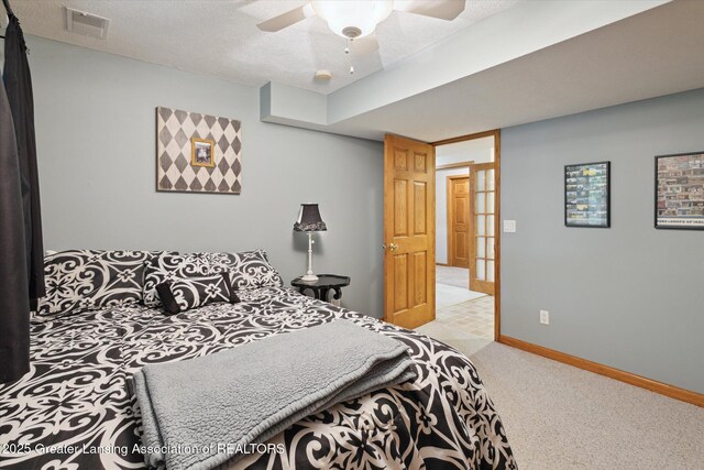 11782 Sara Ann Dr, Dewitt, MI 48820 - carpeted bedroom featuring a ceiling fan, baseboards, and a textured ceiling