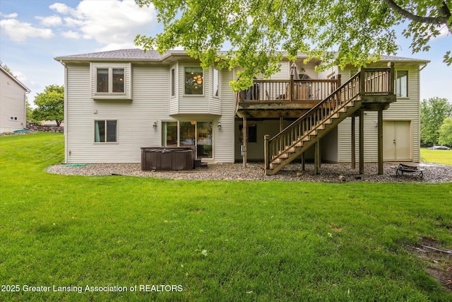 11782 Sara Ann Dr, Dewitt, MI 48820 - back of property featuring a hot tub, a wooden deck, stairs, and a yard