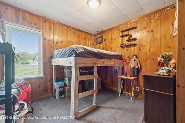 925 Summit St, Owosso, MI 48867 - bedroom featuring carpet and wood walls