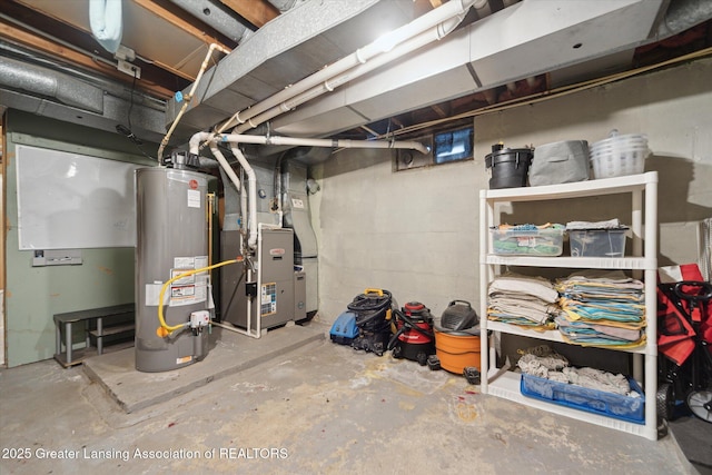 925 Summit St, Owosso, MI 48867 - unfinished below grade area with water heater and heating unit