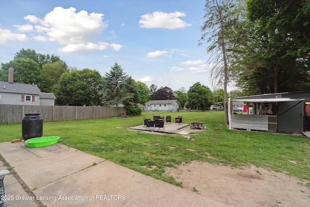 925 Summit St, Owosso, MI 48867 - view of yard with a patio and an outdoor fire pit