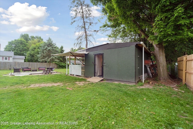 925 Summit St, Owosso, MI 48867 - view of yard with an outdoor structure and a patio