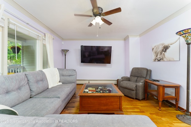 5013 Algonquin Way, Okemos, MI 48864 - living area with a ceiling fan, a baseboard heating unit, wood finished floors, and ornamental molding
