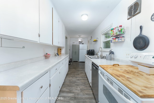 5013 Algonquin Way, Okemos, MI 48864 - kitchen with white appliances, a sink, white cabinetry, and dark wood-style flooring