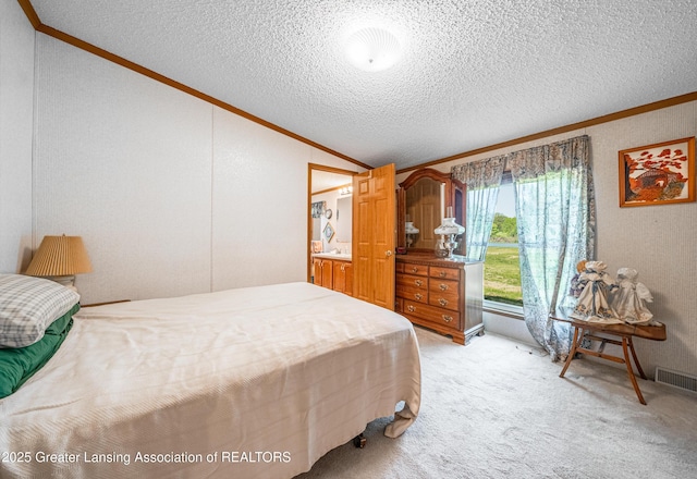 1200 S Michigan Rd, Eaton Rapids, MI 48827 - bedroom with ornamental molding, vaulted ceiling, a textured ceiling, and light carpet