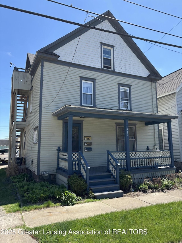 1417 Reo Ave, Lansing, MI 48910 - view of front of property featuring a porch