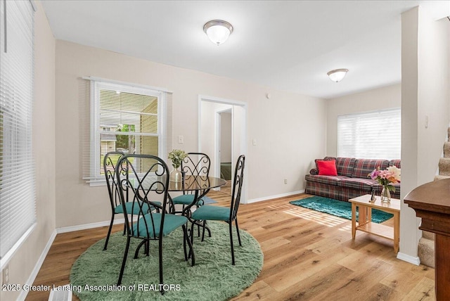 1128 Hickory St, Lansing, MI 48912 - dining room with wood finished floors and baseboards
