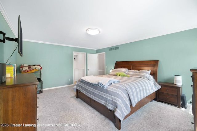 2038 Woodfield Rd, Okemos, MI 48864 - carpeted bedroom with crown molding and baseboards