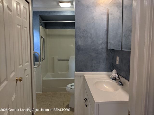 15632 Park Lake Rd, East Lansing, MI 48823 - bathroom with tile patterned floors, toilet, vanity, and shower / tub combination