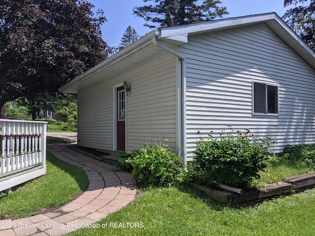 15632 Park Lake Rd, East Lansing, MI 48823 - view of property exterior with a wooden deck